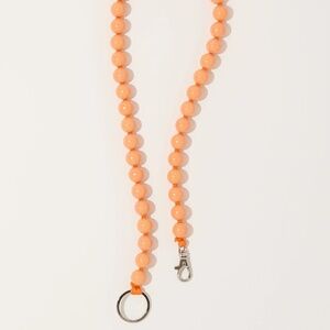 Ina Seifart Perlen Long Keyholder in Peach with Orange Thread